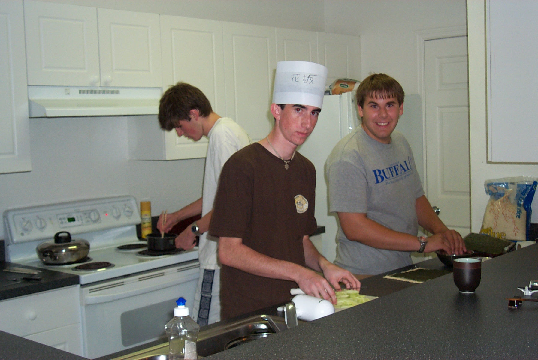 Doug and I with Todd over the stove