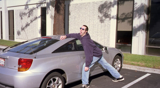 The Celica being molested.