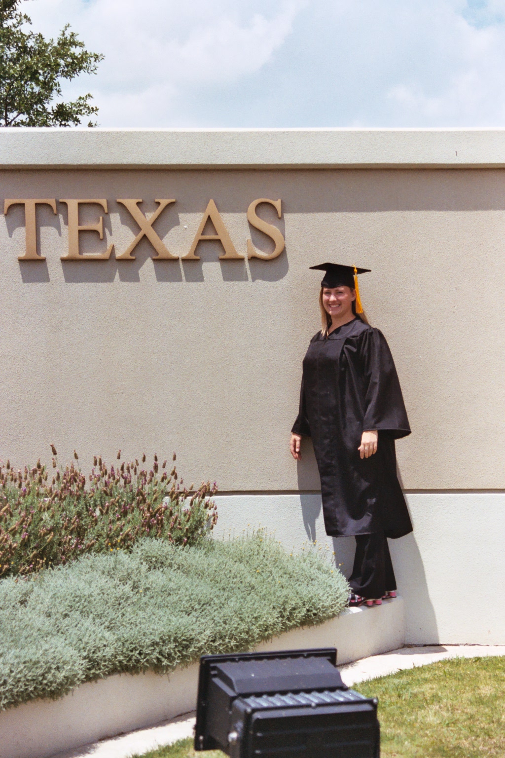 Robyn in front of UT Dallas marquee
