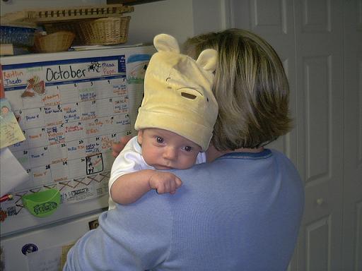 Sammy on at Aunt Donna's shoulder with his Pooh hat for Halloween