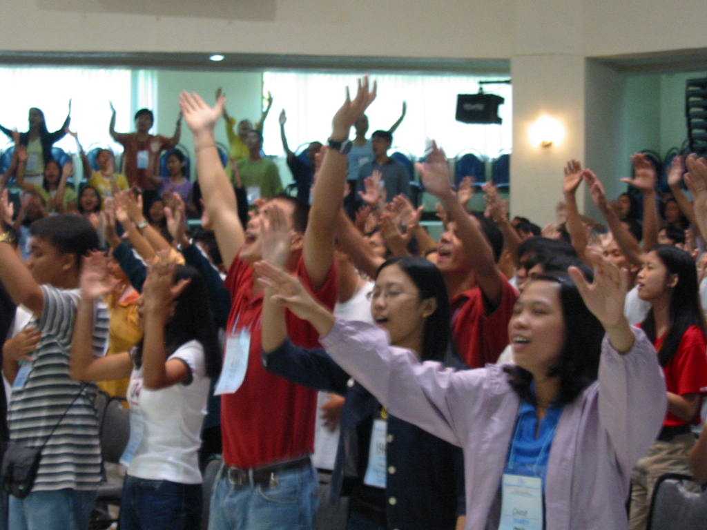 praising God with all their hearts during worship time
