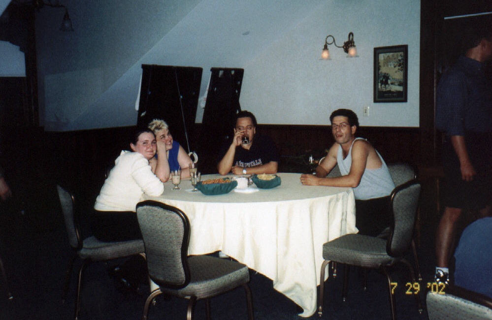 Nancy, Ann, Mauricio and Ozzie (with Kevin running away)