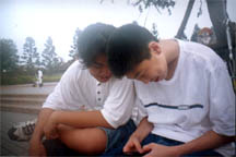 2 Gayasses focusing on a 2cm by 3 cm screen... playing snake... get a life boys~ hehehe~