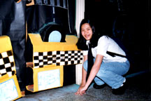 Mei Lu Wynne posing before Her master Piece, the 'Flip-flop Taxi'~ hehe~