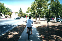 jon biking down st. teresa road, right outside our dorm~