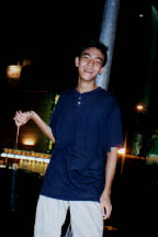 Sexyman Posing Under the Soft Light of the Street Lamp