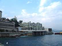 buildings standing over the sea~