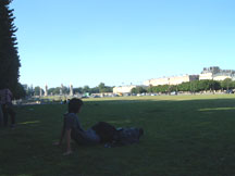 sitting on the greens watching Pont Alexandre II (a bridge)~
