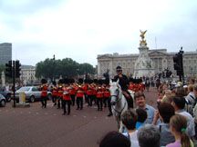 every noontime a marching band starts from buckingham palace
