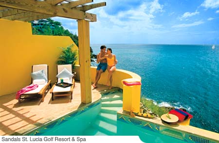 Sandals St. Lucia Golf Resort & Spa unveils the magnificent Villas On Sunset Bluff. Built directly on a lofty ridge where spectacular ocean views unfold into Technicolor sunsets, 56 flawless new suites and villa suites cradle every conceivable comfort. Soak up the elevated ambiance at the impressive new pool high on the bluff with its very own lively swim-up pool bar. Now, a total of 3 freshwater swimming pools beckon you, not forgetting the biggest saltwater pool of all... the turquoise ocean gently lapping the shores of the half mile crescent-shaped beach. Theses suites are the ultimate suite experience. Set 70 feet above the Caribbean sea, overlooking almost the entire expanse of 210 lush acres of the property. Large bedroom, personal plunge pool and view of the ocean and Mountains 