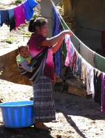 Eulalia, one of our health communicators, with her cheery daughter Lena