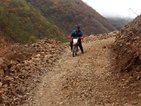 head nurse Alma again, braving treacherous roads on two wheels