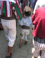 walking along in Maxi's procession