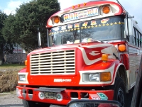one of the many colorful repainted American schoolbuses,