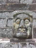 an ancient face at the Mayan ruins at Cop�n