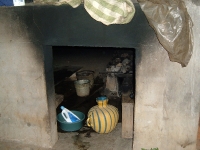 a glimpse inside the chuj: buckets for hot & cold water, and a bottle of shampoo