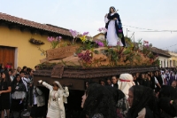 the Virgin is carried by an all-female crew of mourners