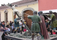 the Romans raise the cross