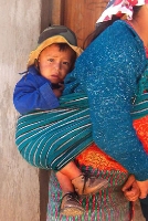 a small patient brought by his mom to our clinic in Cheche