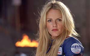 Monet in a film with long blonde hair.
