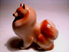 Pomeranian red figurine