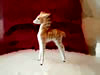 Zebra-calf standing figurine