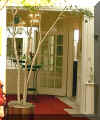 Entry Alcove - We put in a tall bar table and painted the walls a pale yellow.