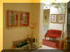 Another View from the Inside of the Bar The red Persian pictures tie in the red velvet couch and rug from the other room.