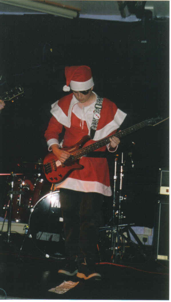 that could be anyone in that suit ! I'l claim im checking my setlist, but i might be shoegazing. Yes the blackmail potential is pretty high on tis picture, but remember, ive got dirt on all of you (evil chuckle)