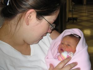 Pic, Lisa holding her baby