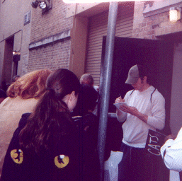 Getting autographs. See the girl in the hoodie? Wish I had gotten one. Oh well, there's always next time.