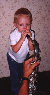 playing Dad's saxaphone
