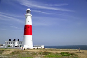 lighthouse on shoreline &copy; freefoto.com