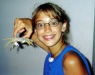 My cousin holding a white crab.