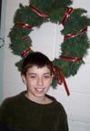 Boy near wreath