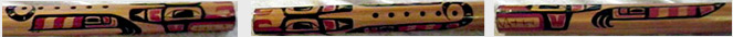 Close up image of wolf design on cedar flute