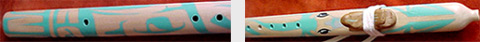 Close up image of loon design on yellow cedar flute