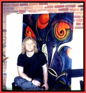 Chuck with painting by Tom Penai..