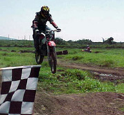 Sebastian Ray takes the checkard flag