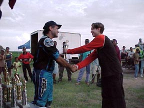 Alan langdon (right) Recieving 1st place trophy in the 80cc class
