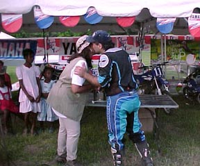 John Ammar collecting One his of Three 1st place trophys