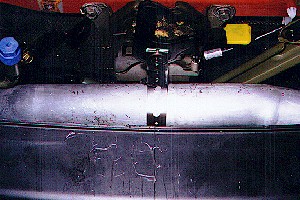 Top IC pipe connected to hood latch
