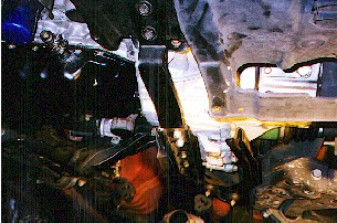 Modified cross member on car