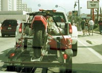 R1_F07_Muitas_chegam_de_reboque.jpg