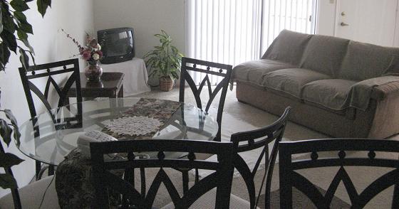 Madrid 45" round glass top table Dining Room Table with 4 Chair + 2Bar chair $350,3 Seater Couch with Cover ,$150 Wooden carved table $20 ,&nbsp; 20" Samsung TV with remote $25