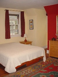 Master bedroom with five windows and large walk-in closet (15x15.5 feet)
