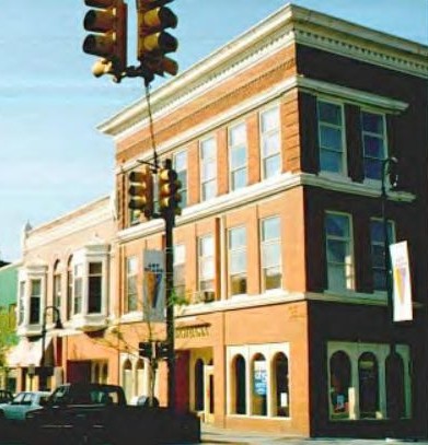 This building was Mt Pleasant Furniture & Hardware for many years, and then Scotts Ace Hardware, and now Firstbank. The building on it's south wall, was built for The Exchange Bank, which moved out in 1908.