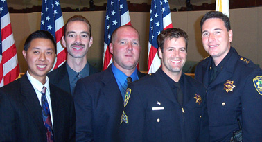 New MPPD Officers: L-R, Res. Officer Stan Szeto; Officer Eric Dias; Officer Christopher Egan; Sgt. Eric Cowans; Police Chief Scott S.G. Vermeer - at swearing-in -- October 24, 2001