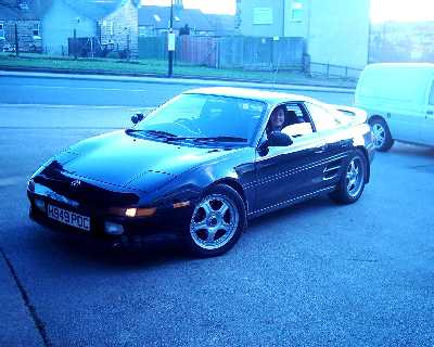 my girlie smiling at TVR garage