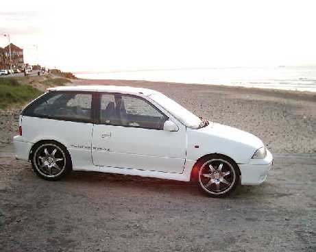 My mates Swift GTi 16v with new wheels...